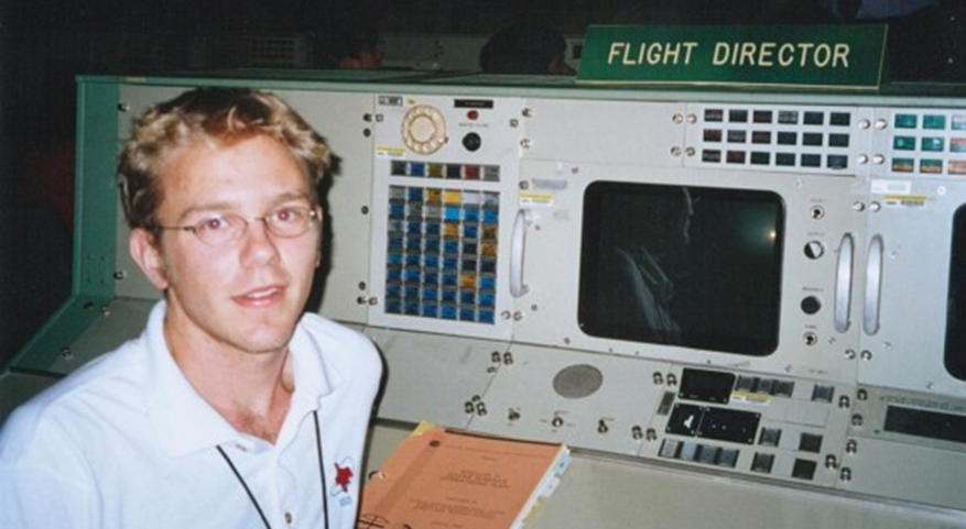 A very young JJW (sans beard) sitting at the Flight Director’s desk in the original Mission Control in Houston, Texas.