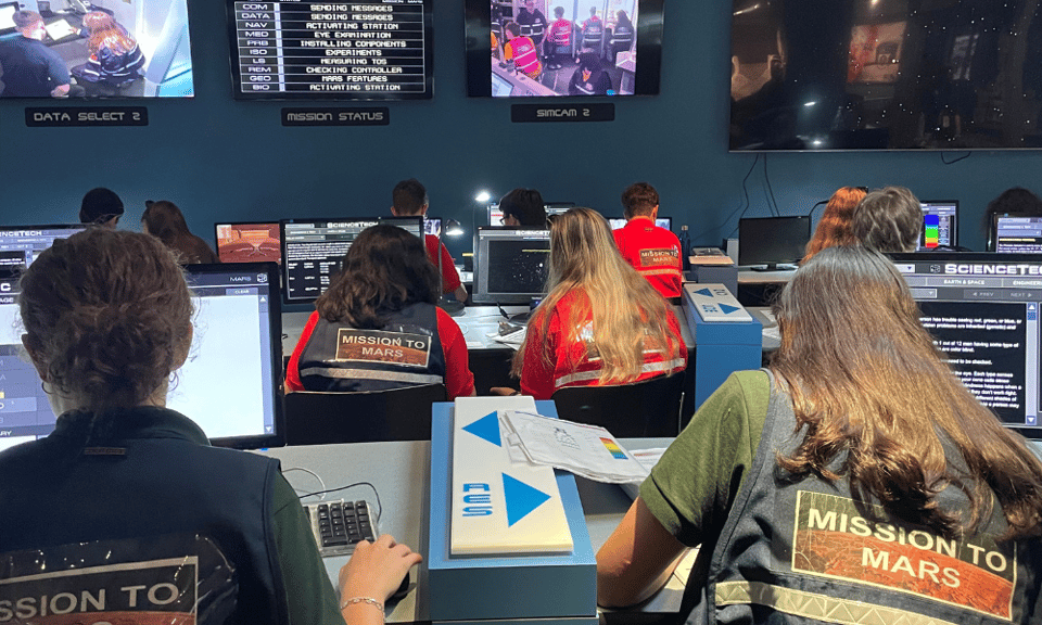 Students work away on their mission to mars.