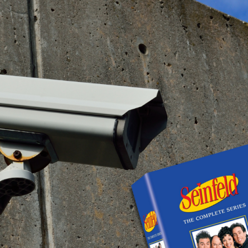 A surveillance camera looking at a box set of Seinfeld DVDs while geese fly past.